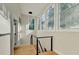 Modern light-filled staircase with cable railing at 5255 Buice Rd, Alpharetta, GA 30022