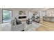 Bright living room with hardwood floors, fireplace and access to outdoors at 5255 Buice Rd, Alpharetta, GA 30022