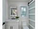 Stylish bathroom featuring a floating vanity and walk-in shower at 5255 Buice Rd, Alpharetta, GA 30022