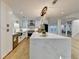 Modern kitchen with large island and breakfast bar at 5255 Buice Rd, Alpharetta, GA 30022