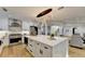 Modern kitchen with large island and stainless steel appliances at 5255 Buice Rd, Alpharetta, GA 30022