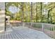 Spacious deck overlooking a wooded backyard at 5255 Buice Rd, Alpharetta, GA 30022
