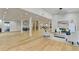 Open concept living area with hardwood floors and recessed lighting at 5255 Buice Rd, Alpharetta, GA 30022