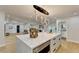 Open concept kitchen with large island and breakfast bar at 5255 Buice Rd, Alpharetta, GA 30022
