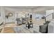 Open living area showcasing hardwood floors and kitchen view at 5255 Buice Rd, Alpharetta, GA 30022