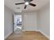 Bright bedroom with hardwood floors and double closet at 5255 Buice Rd, Alpharetta, GA 30022