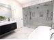 Spa-like bathroom with a large walk-in shower and soaking tub at 5255 Buice Rd, Alpharetta, GA 30022