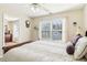 Bright bedroom with large window, plush bedding, and ample natural light at 3709 Mcguire Nw St, Kennesaw, GA 30144