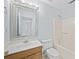 Light and airy bathroom with a vanity, toilet, and shower/tub at 3141 Little Forest Ct, Snellville, GA 30078