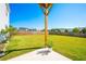 Large backyard with grassy area and wooden fence at 2650 Inshore Dr, Cumming, GA 30041