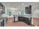 Modern kitchen featuring granite countertops and stainless steel appliances at 239 Hardy Water Dr, Lawrenceville, GA 30045