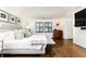 Bright bedroom featuring hardwood floors and ample natural light at 4155 Flintlock Road Nw, Atlanta, GA 30327