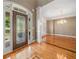 Elegant entryway with hardwood floors, arched entry, and views to the dining room at 4930 Longridge Dr, Villa Rica, GA 30180