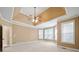 Spacious main bedroom with tray ceiling and ample natural light at 4930 Longridge Dr, Villa Rica, GA 30180