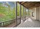 Spacious deck overlooking a wooded backyard at 4930 Longridge Dr, Villa Rica, GA 30180