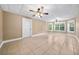 Finished basement with tile floors, ceiling fans and large windows at 4930 Longridge Dr, Villa Rica, GA 30180