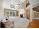 Spacious living room with hardwood and carpet, fireplace, and high ceilings at 4930 Longridge Dr, Villa Rica, GA 30180