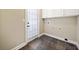 Laundry room with washer, dryer hookups, and slate tile floor at 4930 Longridge Dr, Villa Rica, GA 30180