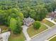 House nestled in a wooded neighborhood at 4930 Longridge Dr, Villa Rica, GA 30180