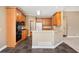 Eat-in kitchen with granite countertops and wood cabinets at 4930 Longridge Dr, Villa Rica, GA 30180