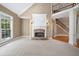 Stone fireplace with white mantel in a spacious living room at 4930 Longridge Dr, Villa Rica, GA 30180