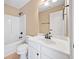 Clean bathroom with white vanity, tub shower combo, and toilet at 4930 Longridge Dr, Villa Rica, GA 30180