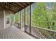Deck with wooded view and stairs leading down at 4930 Longridge Dr, Villa Rica, GA 30180