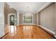Spacious dining room featuring hardwood floors and large windows at 4930 Longridge Dr, Villa Rica, GA 30180