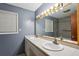 Bathroom with double vanity and large mirror at 3024 Bob Cox Rd, Marietta, GA 30064