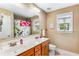 Bathroom with double sinks and shower/tub combo at 713 Bronze Ct, Acworth, GA 30102