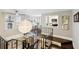 Loft overlooking living room with open railing and hardwood floors at 1078 Piedmont Ne Ave # 106, Atlanta, GA 30309