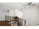Loft area with open railing and a large, round paper lantern at 1078 Piedmont Ne Ave # 106, Atlanta, GA 30309