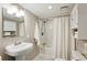 Clean bathroom with tub, shower, and sink at 1078 Piedmont Ne Ave # 106, Atlanta, GA 30309