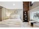 Main bedroom with king-size bed and exposed brick at 1078 Piedmont Ne Ave # 106, Atlanta, GA 30309