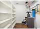 Basement storage room with shelving and water filtration system at 3848 Saint Annes Ct, Duluth, GA 30096