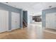 Spacious entryway with laminate flooring and staircase at 1467 Riverrock Trl, Riverdale, GA 30296