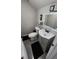 Basement bathroom with modern vanity and LED mirror at 818 Lee Andrews Ave, Atlanta, GA 30315