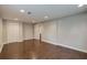 Finished basement room with hardwood floors and ample closet space at 174 Rivertown Rd, Fairburn, GA 30213