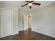 Bedroom with hardwood floors and double closet at 174 Rivertown Rd, Fairburn, GA 30213