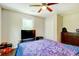 Bedroom with hardwood floors and dresser at 174 Rivertown Rd, Fairburn, GA 30213