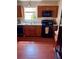 Kitchen with granite countertops and hardwood floors at 1026 Autumn Crest Ct, Stone Mountain, GA 30083