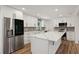 Modern kitchen with stainless steel appliances and white cabinetry at 4125 Oakwood Trl, Cumming, GA 30040