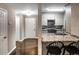 Bright and spacious entryway with hardwood floors and access to kitchen at 2212 River Green Nw Dr, Atlanta, GA 30327