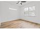 Bright bedroom featuring light hardwood floors and a large window at 1016 Michigan Nw Ave, Atlanta, GA 30314