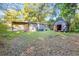 View of backyard, shed and partially wooded area at 398 Cologne Se Dr, Atlanta, GA 30354