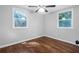Spacious bedroom with hardwood floors and two windows at 398 Cologne Se Dr, Atlanta, GA 30354