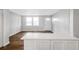 Living room with hardwood floors and open concept to kitchen at 398 Cologne Se Dr, Atlanta, GA 30354