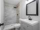 Modern bathroom with a large shower and gray vanity at 398 Cologne Se Dr, Atlanta, GA 30354