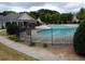 Community swimming pool with surrounding lounge chairs at 2555 Flat Shoals Rd Apt # 3305, College Park, GA 30349