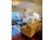 Spacious living room with hardwood floors and comfy furniture at 2555 Flat Shoals Rd Apt # 3305, College Park, GA 30349